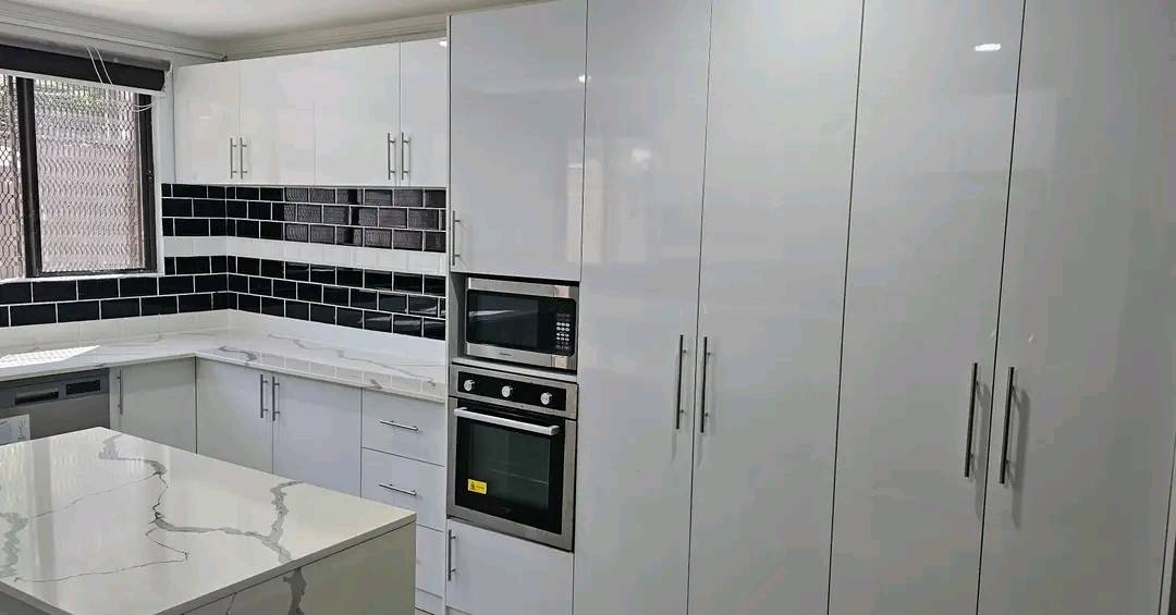 Granite kitchen top installation done by Granite Carpentry.